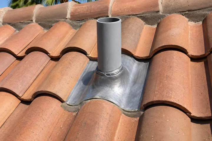 Vent pipe with a new boot on a tile roof